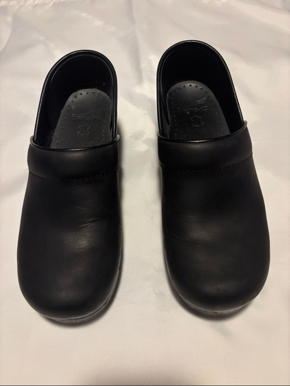 Dansko Black Leather Slip-On Clogs
